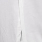 Selah - Bílé šaty s dlouhým rukávem a výřezem v pase s akcenty z kamínků