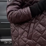 Bogna | Elegantní prošívaná péřová bunda s kapucí.